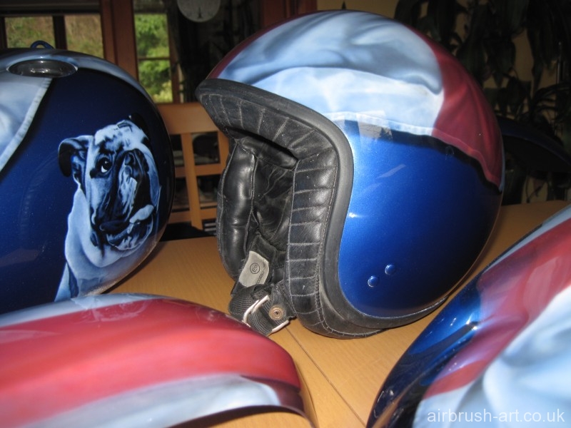 Blue helmet matches the Harley Davidson motorcycle.
