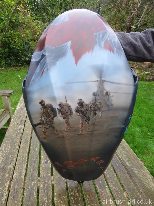 Harley-davidson Vrod tank airbrushed with British paratrooper in Afghanistan. A torn Union Flag has been airbrushed over the top of the tank.