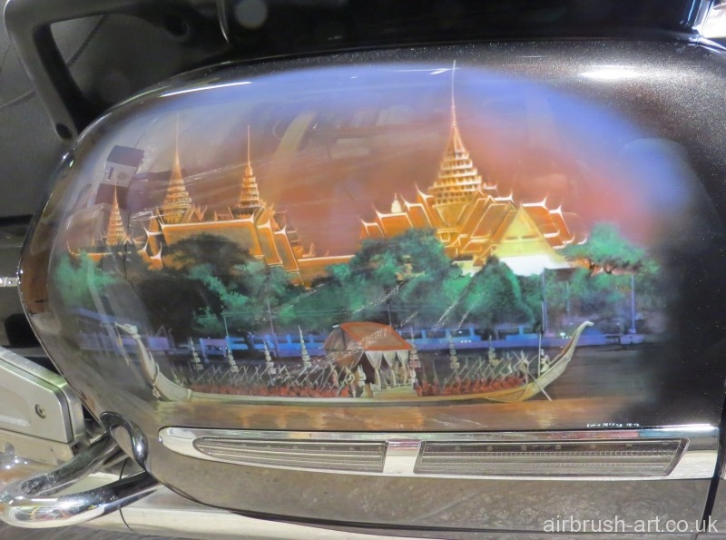 Airbrush Art picture on side panels of a Thai temple and royal boat.